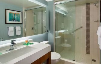 Private guest bathroom with shower at Hyatt Place Washington Dc/Us Capitol.