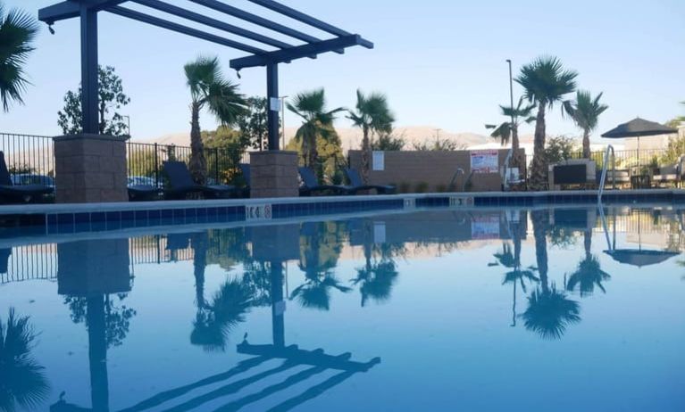 Refreshing outdoor pool at Holiday Inn & Suites Silicon Valley - Milpitas.