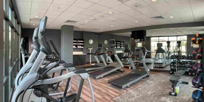 Fitness center at Holiday Inn & Suites Silicon Valley - Milpitas.