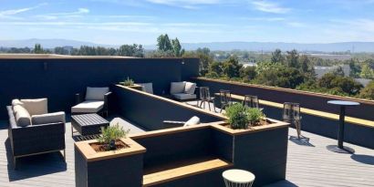 Rooftop outdoor furniture at Holiday Inn & Suites Silicon Valley - Milpitas.