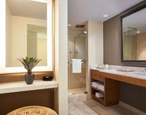 Private guest bathroom with shower at Naples Grande Beach Resort.