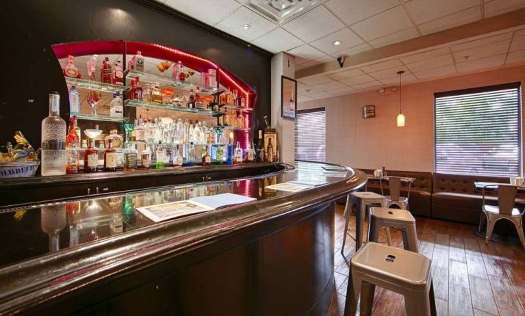 The hotel bar has bar stool seating and a range of liquid refreshments.