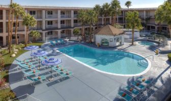 The hotel’s outdoor pool has plenty of loungers and trees nearby when you want a rest and some shade.