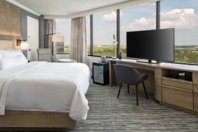 Double bed guest room in the Westin Atlanta Airport Hotel, with large TV and panoramic views.