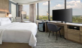 Double bed guest room in the Westin Atlanta Airport Hotel, with large TV and panoramic views.