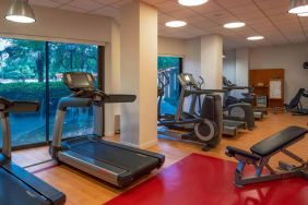 The hotel’s fitness center provides an array of exercise machines for guests.