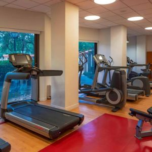 The hotel’s fitness center provides an array of exercise machines for guests.