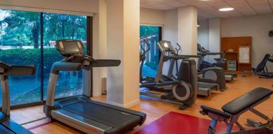 The hotel’s fitness center provides an array of exercise machines for guests.