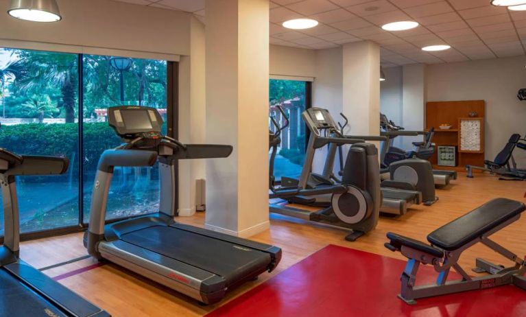 The hotel’s fitness center provides an array of exercise machines for guests.