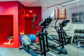 The hotel fitness center has both weights and exercise machines.