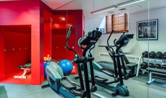 The hotel fitness center has both weights and exercise machines.