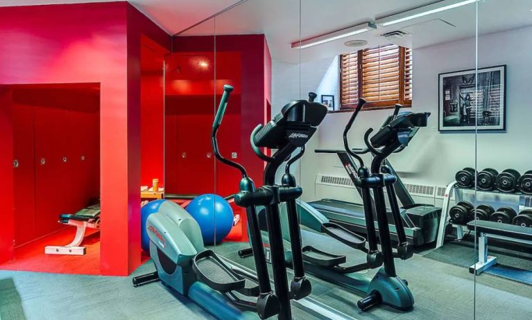 The hotel fitness center has both weights and exercise machines.