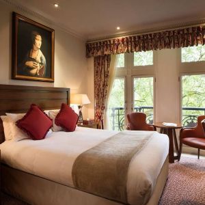 The Royal Horseguards Hotel’s garden view double room, with large windows for a verdant view.