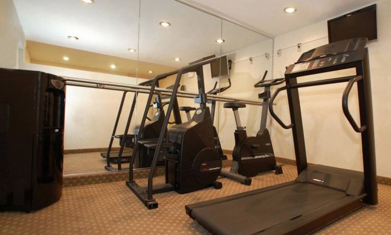 The hotel fitness center offers various different types of exercise machines for guests.