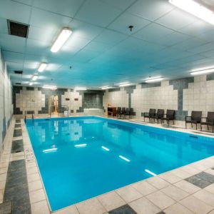 The hotel’s indoor pool has chairs and towels close at hand for swimmers.