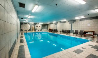 The hotel’s indoor pool has chairs and towels close at hand for swimmers.