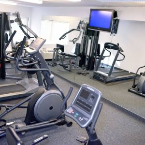 An assortment of exercise machines are accessible in the fitness center.