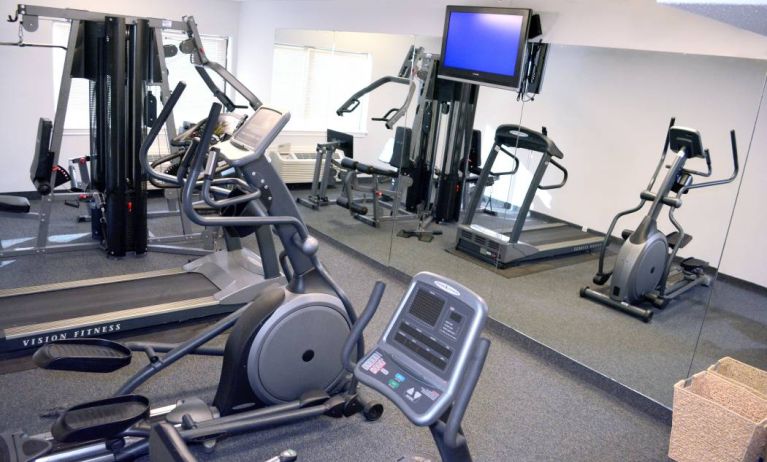 An assortment of exercise machines are accessible in the fitness center.