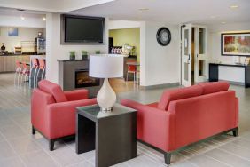 The hotel’s lobby is close to the breakfast area and has comfortable seating for guests.