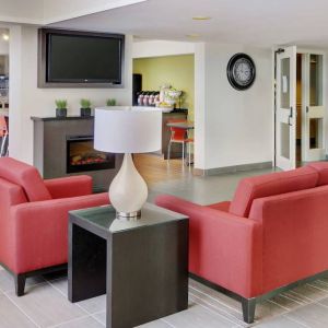 The hotel’s lobby is close to the breakfast area and has comfortable seating for guests.