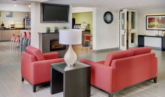 The hotel’s lobby is close to the breakfast area and has comfortable seating for guests.