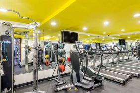 The hotel’s fitness room, furnished with a range of exercise machines.