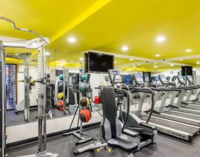 The hotel’s fitness room, furnished with a range of exercise machines.