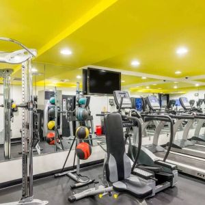 The hotel’s fitness room, furnished with a range of exercise machines.