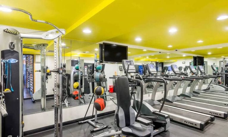 The hotel’s fitness room, furnished with a range of exercise machines.