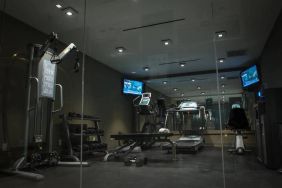 The hotel’s exercise room, with stacked weights and assorted fitness machines.