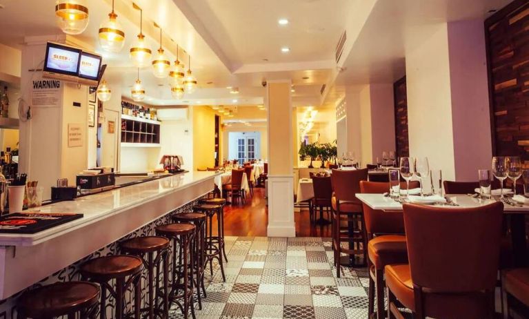 The San Carlos Hotel’s bar, with traditional tall bar stools and tables.