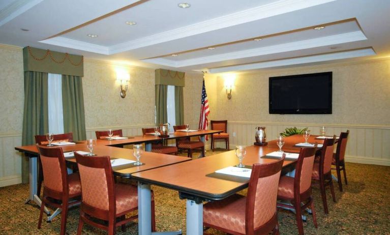 A meeting room in the San Carlos Hotel, with long table and space for a dozen attendees.