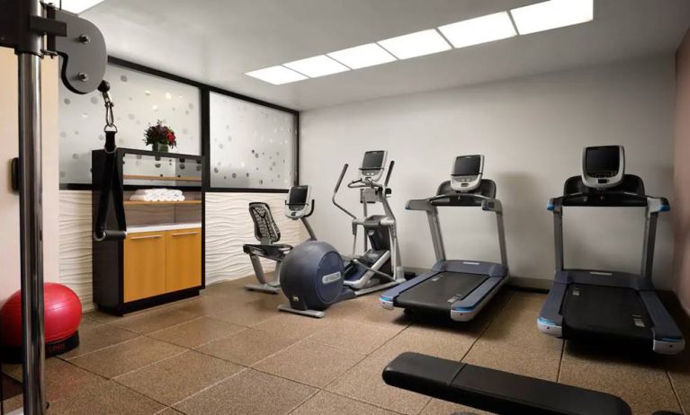 The hotel’s fitness center, equipped with a range of exercise machines.