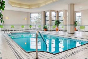 The hotel’s swimming pool is indoors and has plenty of chairs by the side.