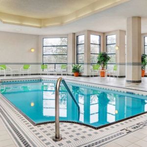 The hotel’s swimming pool is indoors and has plenty of chairs by the side.