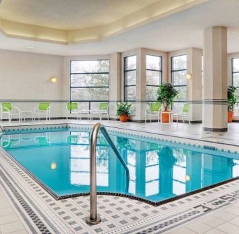 The hotel’s swimming pool is indoors and has plenty of chairs by the side.