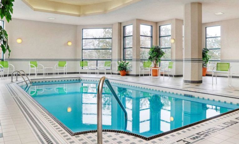 The hotel’s swimming pool is indoors and has plenty of chairs by the side.