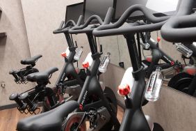 The hotel fitness center, equipped with Peloton exercise bikes.