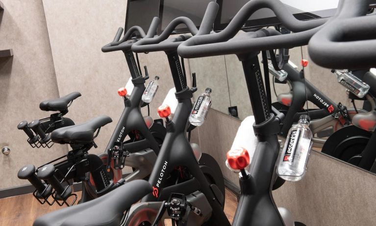 The hotel fitness center, equipped with Peloton exercise bikes.