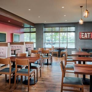 Burger Theory Restaurant and Bar is the on-site dining venue, with tables for four or two diners.