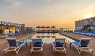 Stunning outdoor pool at sunset at Sea Crest Beach Hotel.