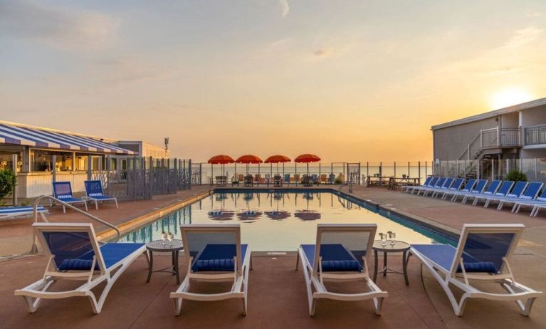 Stunning outdoor pool at sunset at Sea Crest Beach Hotel.