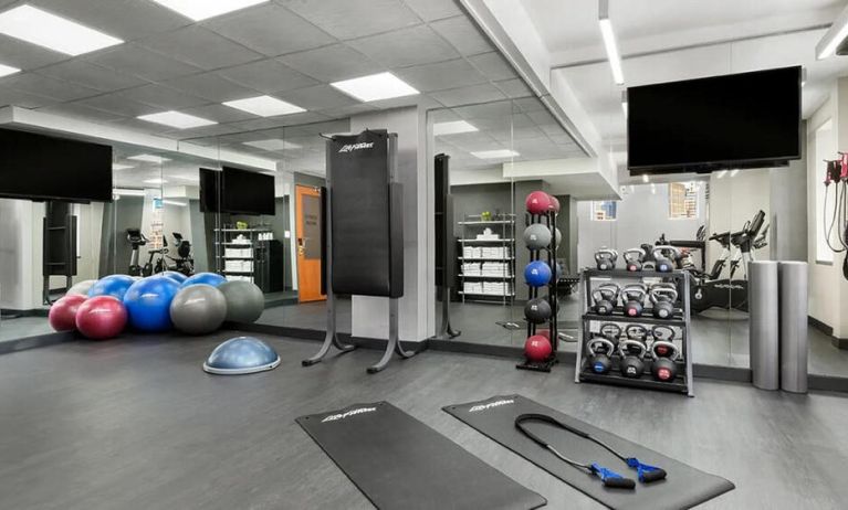 The hotel’s fitness facility, including balls, kettlebells, and assorted machinery.