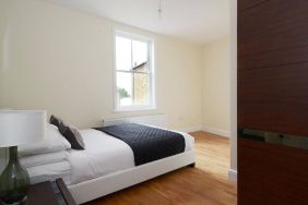 Another view of the double bedroom, with window, in the Hammersmith One.