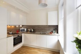 The Hammersmith One’s kitchen, including kettle, oven, microwave, and toaster.