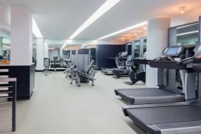 The hotel fitness center, featuring a variety of exercise equipment.