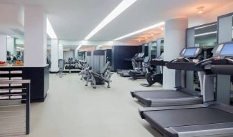 The hotel fitness center, featuring a variety of exercise equipment.