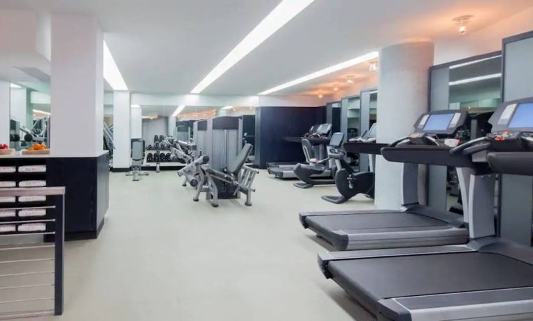 The hotel fitness center, featuring a variety of exercise equipment.