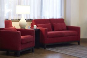 The hotel’s lobby offers comfortable seating for guests to relax.