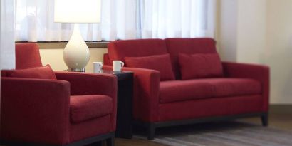 The hotel’s lobby offers comfortable seating for guests to relax.